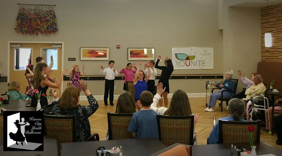 Kansas City Youth Ballroom dancers encouraging movement to music at a Rehabilitation Center in Overland Park, KS